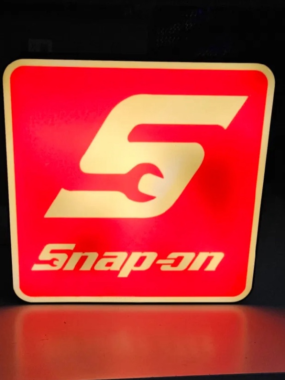 Snap red and white logo display sign